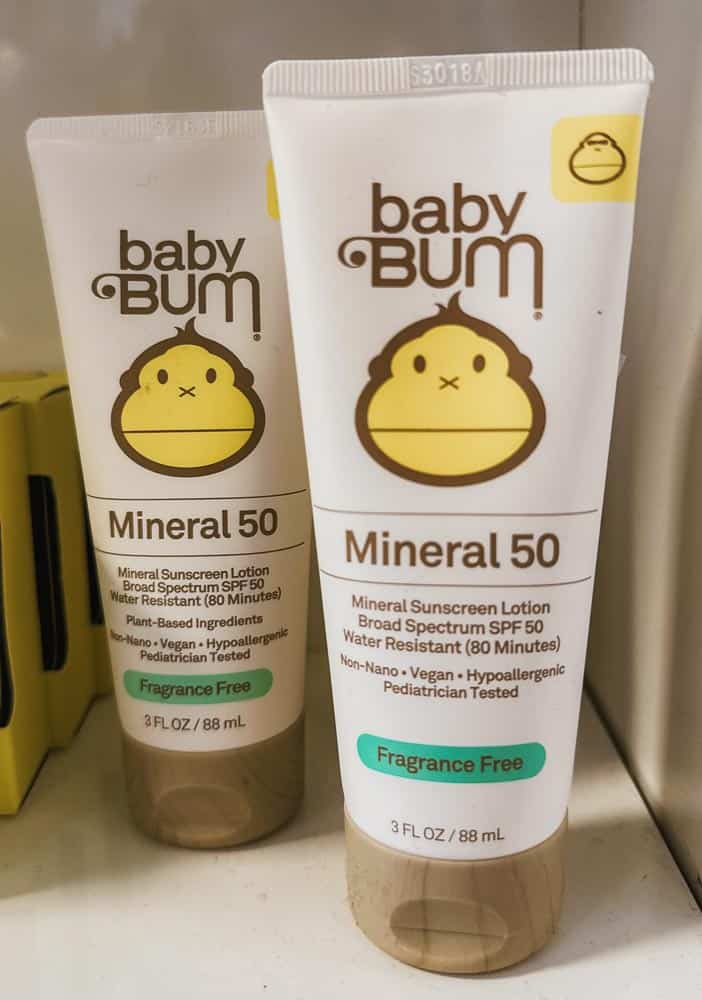 two bottles of 50 SPF baby bum mineral Sun Bum sunscreen